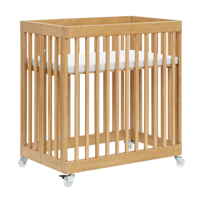M29880HY,Babyletto,Pogo 8-in-1 Convertible Crib w/ Bassinet & Toddler Bed Kits in Honey
