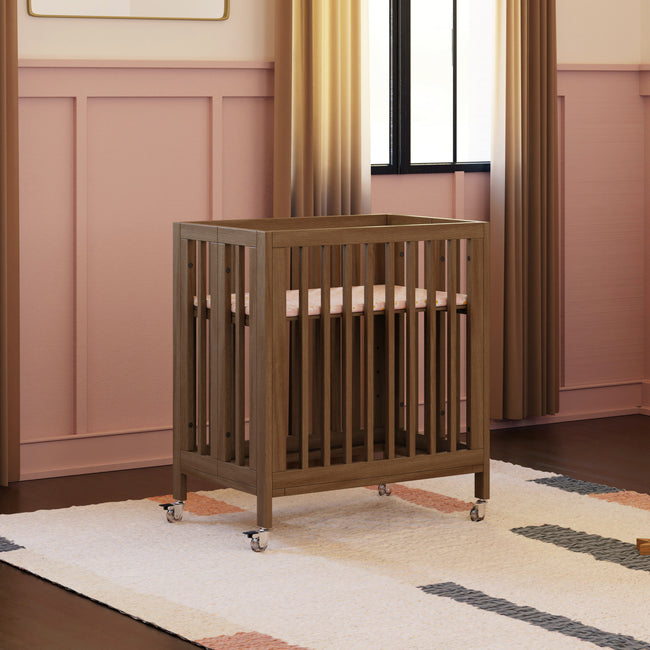 M30880NL,Babyletto,Rolli 9-in-1 Convertible All-Stages® Crib w/ Bassinet & Toddler Bed Kits in Natural Walnut